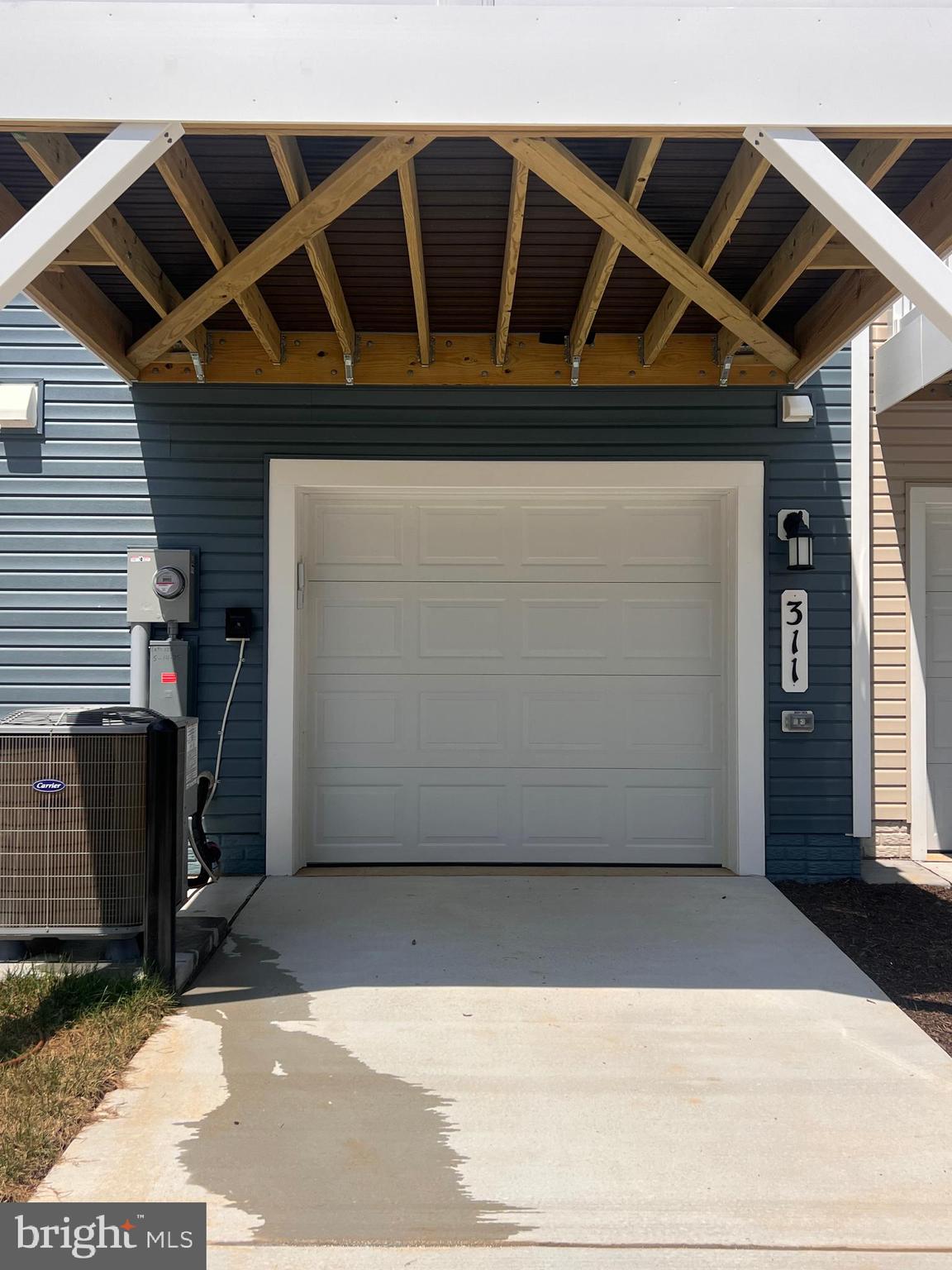 311 Sandy Btm Circle Ranson, WV 25438 - Photo 6 of 33 a view of a house with a door