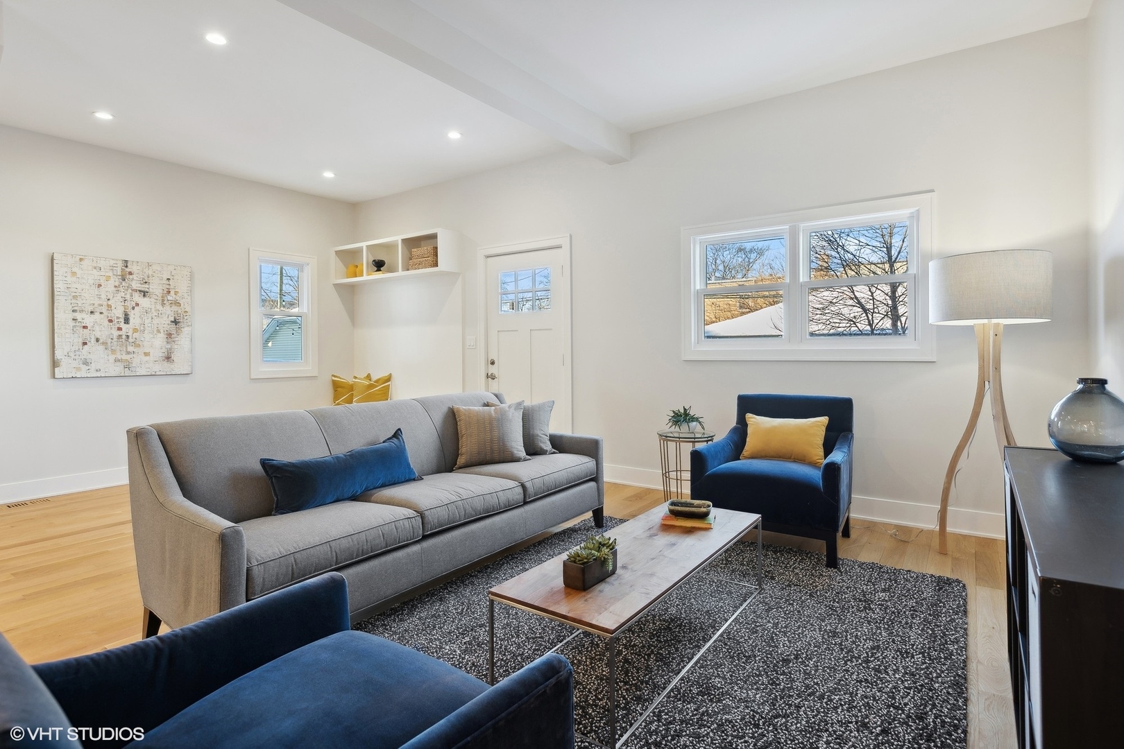 3414 North Tripp Avenue Chicago, IL 60641 - Photo 13 of 38 a living room with furniture and a rug