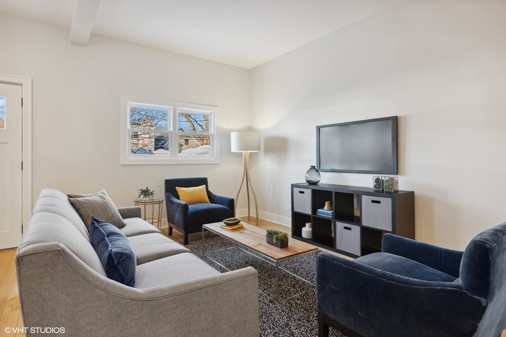 3414 North Tripp Avenue Chicago, IL 60641 - Photo 14 of 38 a living room with furniture and a flat screen tv