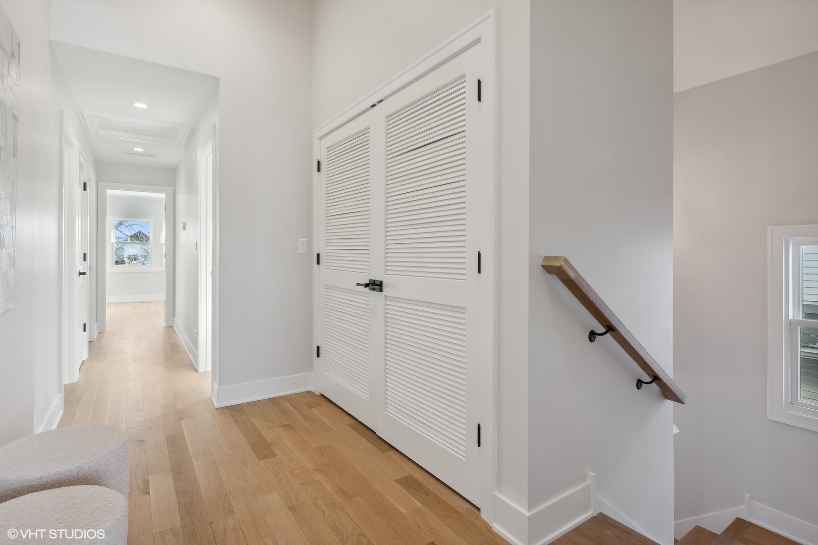 3414 North Tripp Avenue Chicago, IL 60641 - Photo 18 of 38 a view of a hallway with wooden floor and staircase