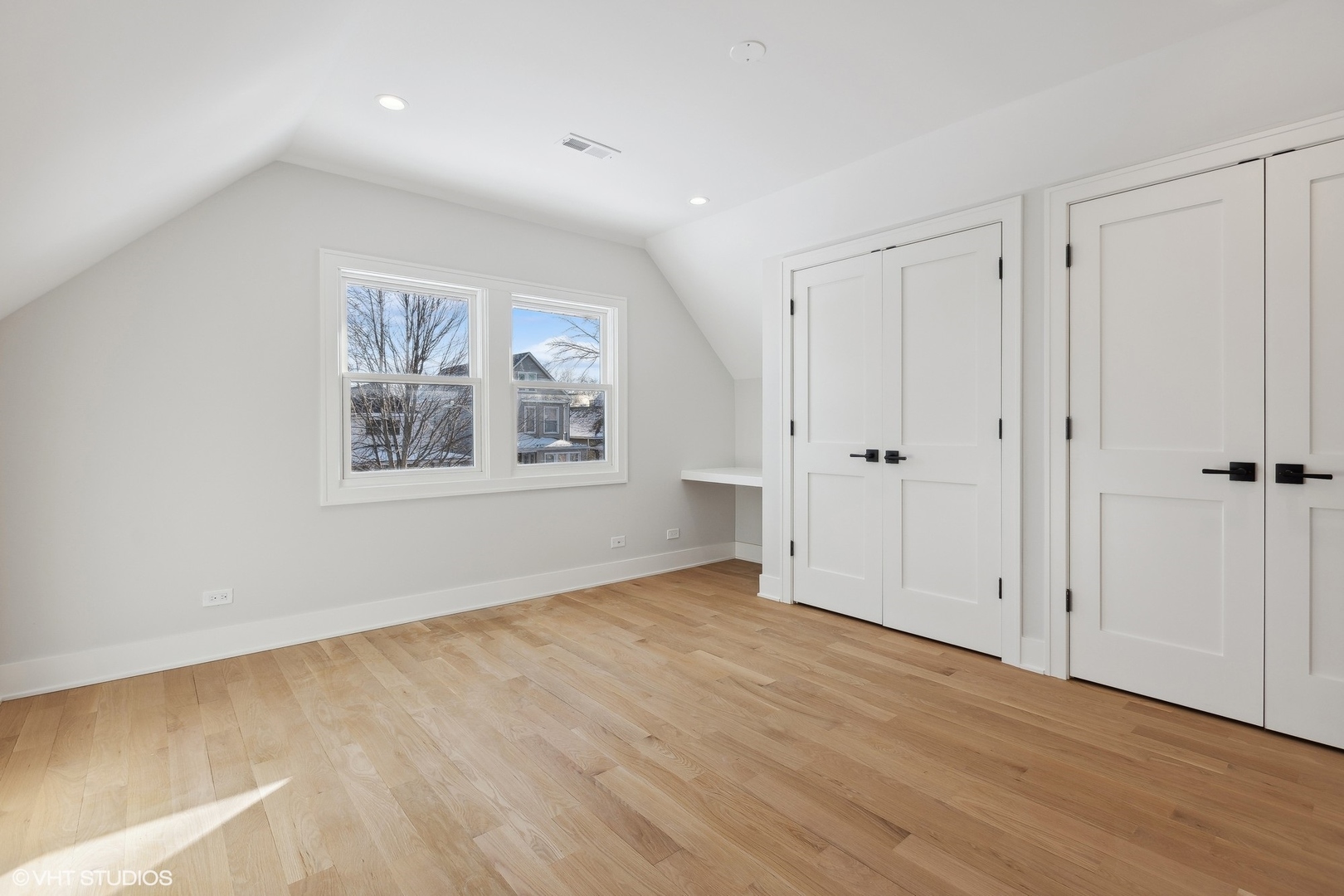 3414 North Tripp Avenue Chicago, IL 60641 - Photo 26 of 38 a view of an empty room with wooden floor