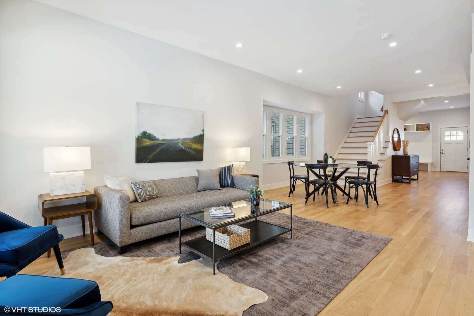 3414 North Tripp Avenue Chicago, IL 60641 - Photo 3 of 38 a living room with furniture and a wooden floor