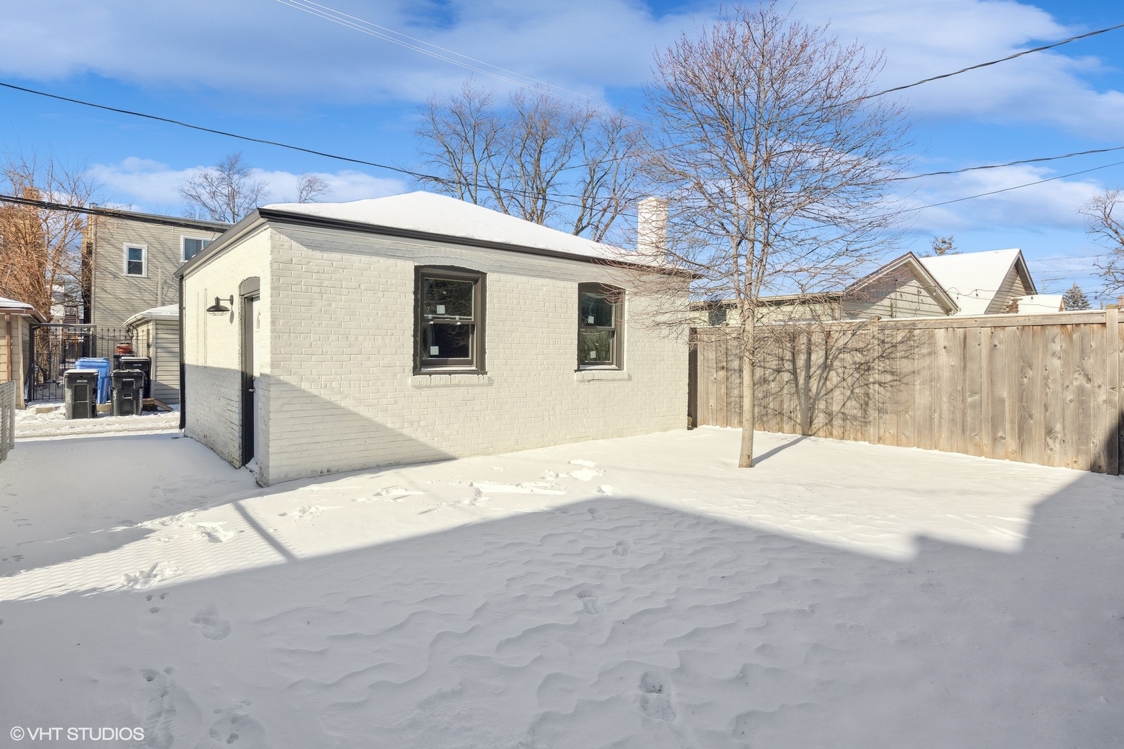 3414 North Tripp Avenue Chicago, IL 60641 - Photo 33 of 38 a front view of a house with a yard and garage