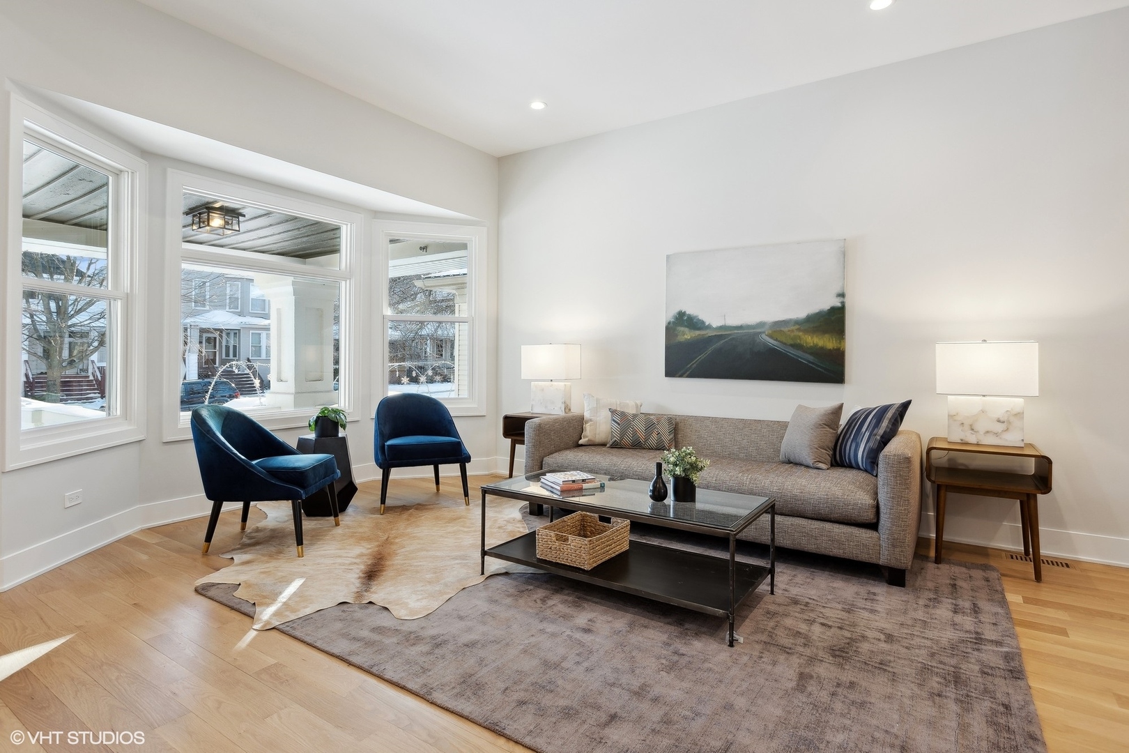 3414 North Tripp Avenue Chicago, IL 60641 - Photo 5 of 38 a living room with furniture and a large window