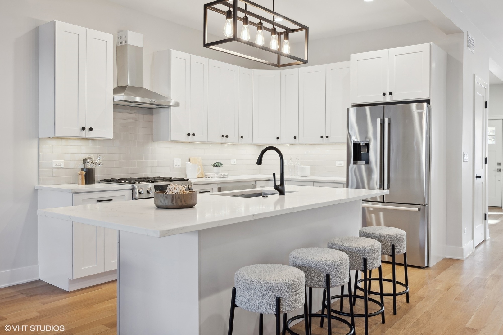 3414 North Tripp Avenue Chicago, IL 60641 - Photo 10 of 38 a kitchen with stainless steel appliances a sink and cabinets