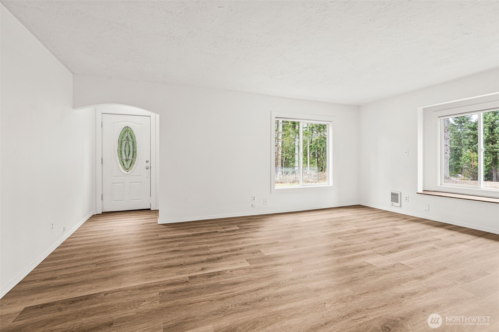 1755 Centralia Alpha Road Chehalis, WA 98532 - Photo 13 of 35 wooden floor in an empty room with a window