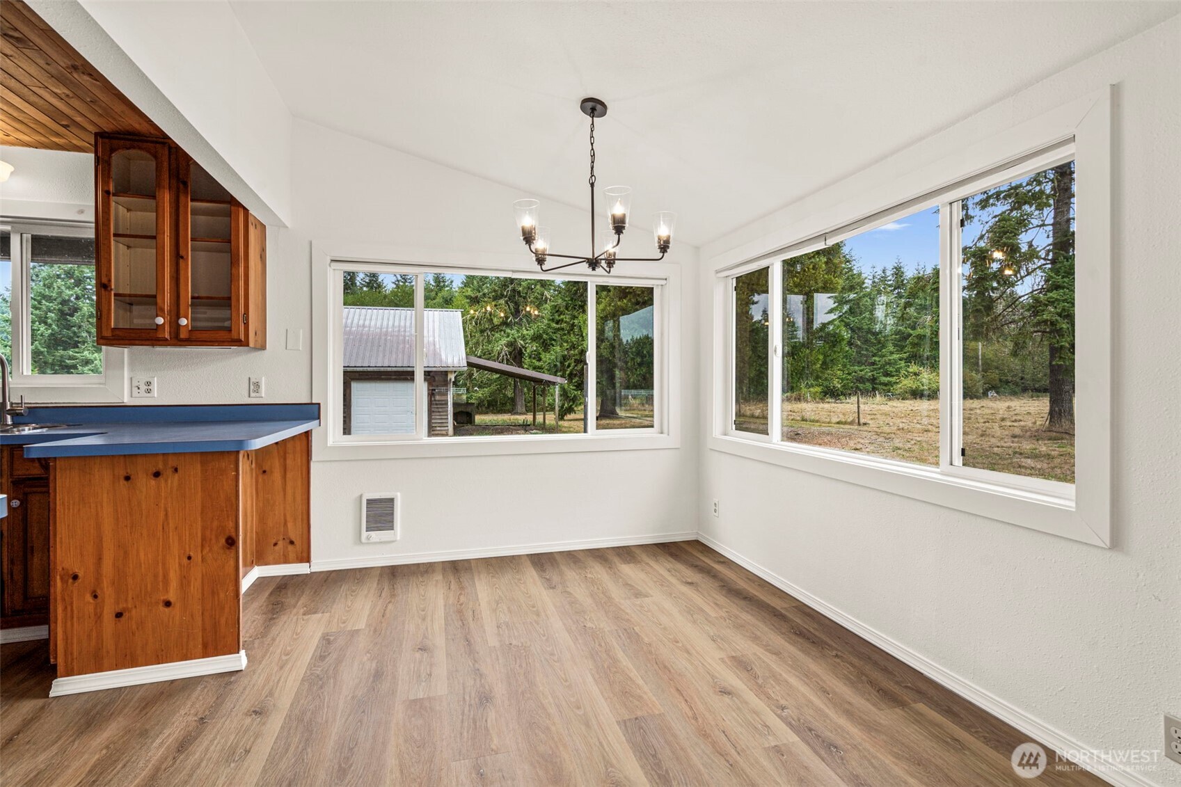1755 Centralia Alpha Road Chehalis, WA 98532 - Photo 19 of 35 a view of a room with wooden floor and outdoor view