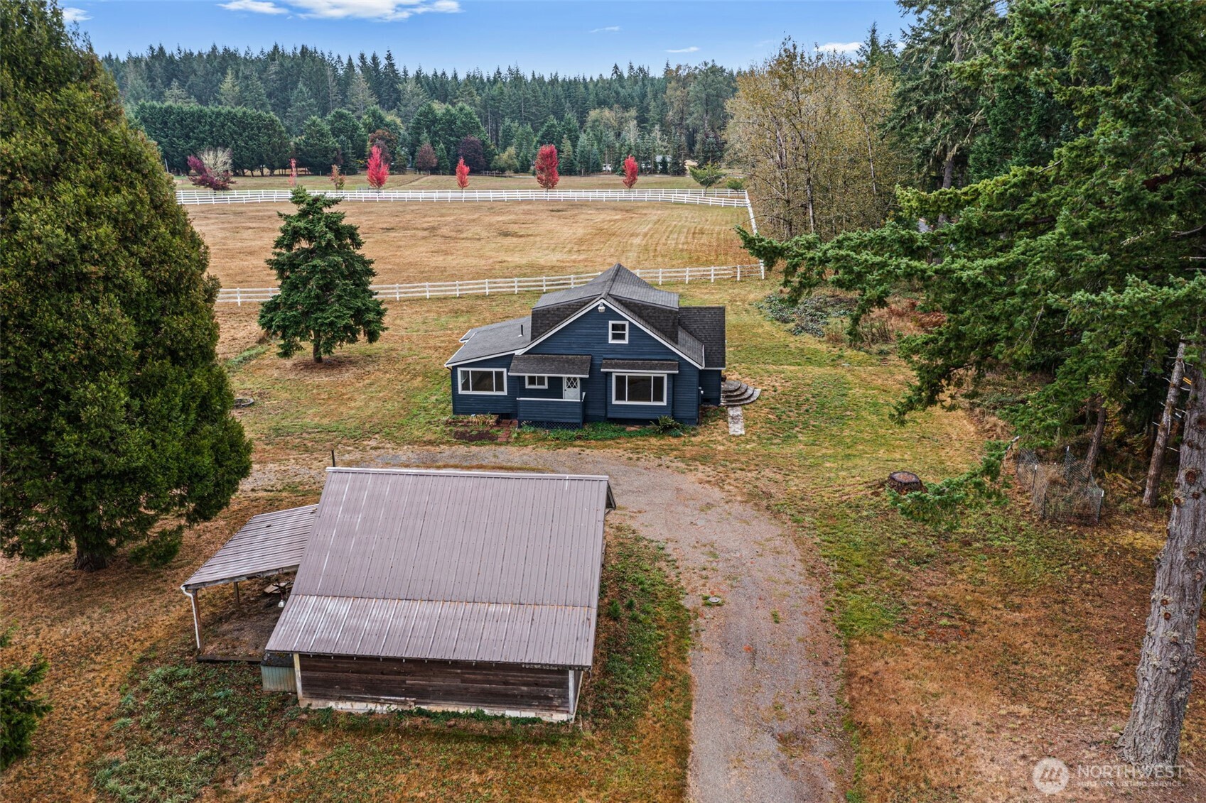 1755 Centralia Alpha Road Chehalis, WA 98532 - Photo 3 of 35 a view of house with river and trees in the background