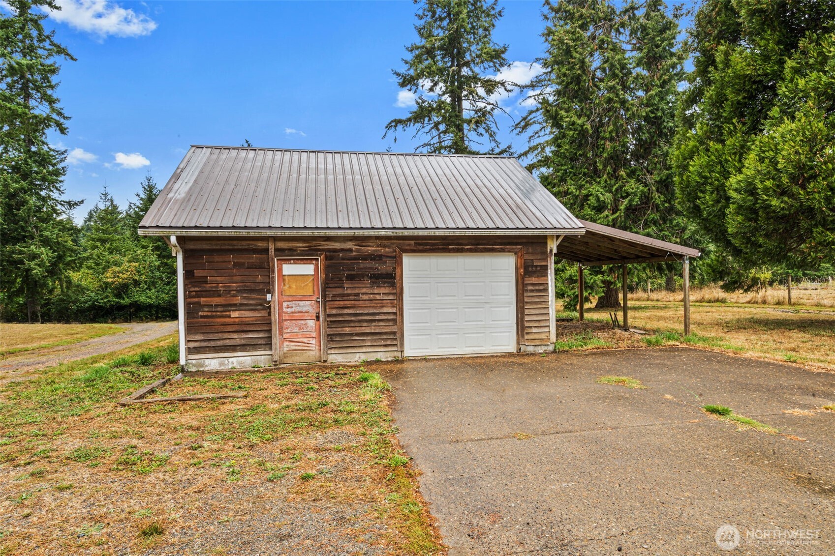 1755 Centralia Alpha Road Chehalis, WA 98532 - Photo 34 of 35 a view of a house with a yard and garage