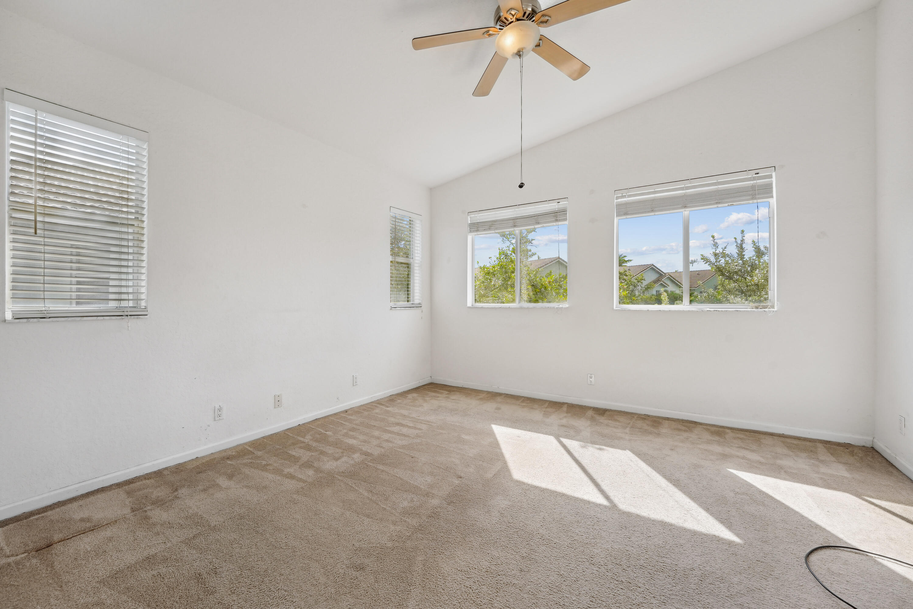 3258 Laurel Ridge Circle Riviera Beach, FL 33404 - Photo 14 of 27 Primary Bedroom