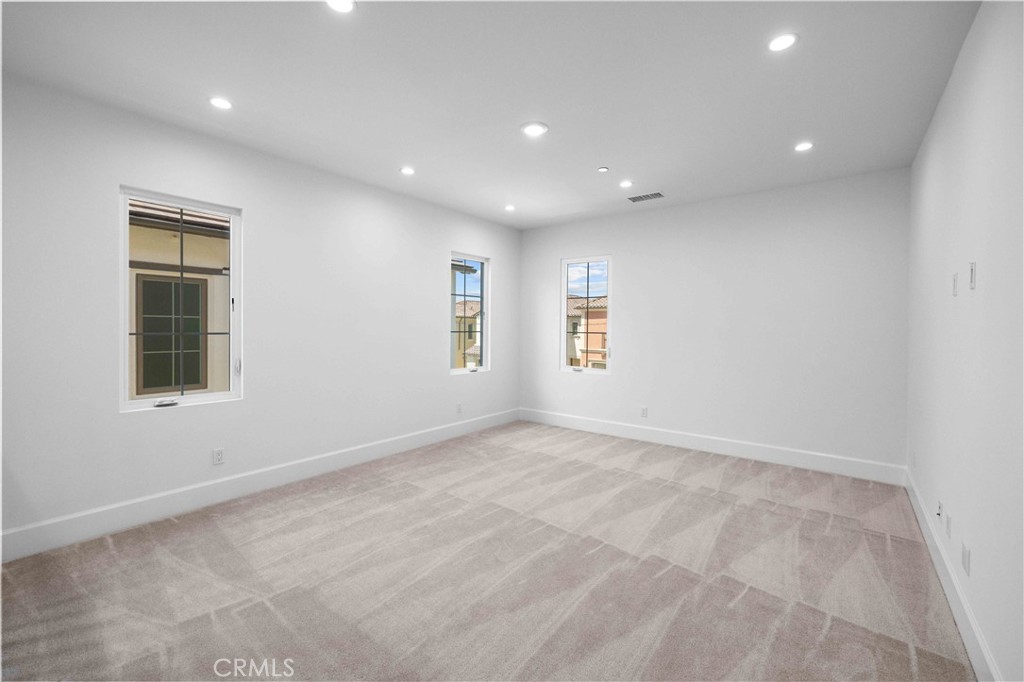 220 Fiore Irvine, CA 92602 - Photo 12 of 26 an empty room with windows