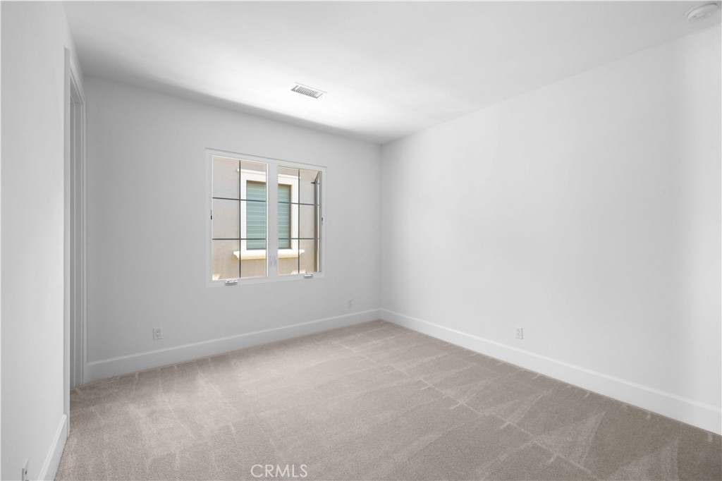 220 Fiore Irvine, CA 92602 - Photo 17 of 26 an empty room with a window