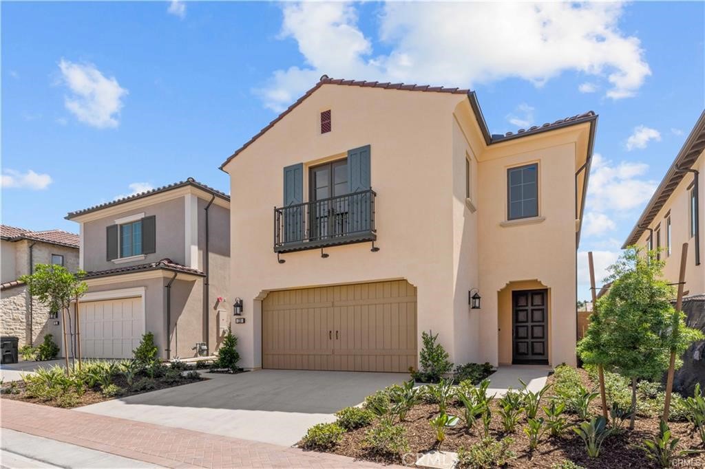 220 Fiore Irvine, CA 92602 - Photo 26 of 26 a front view of a house with a yard