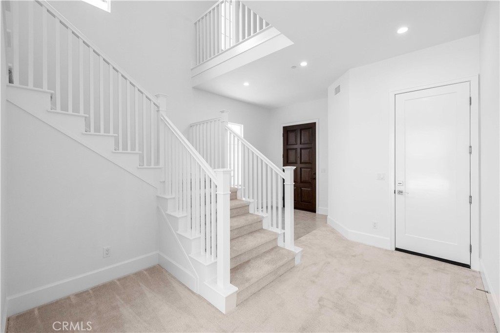 220 Fiore Irvine, CA 92602 - Photo 3 of 26 a view of entryway with stairs