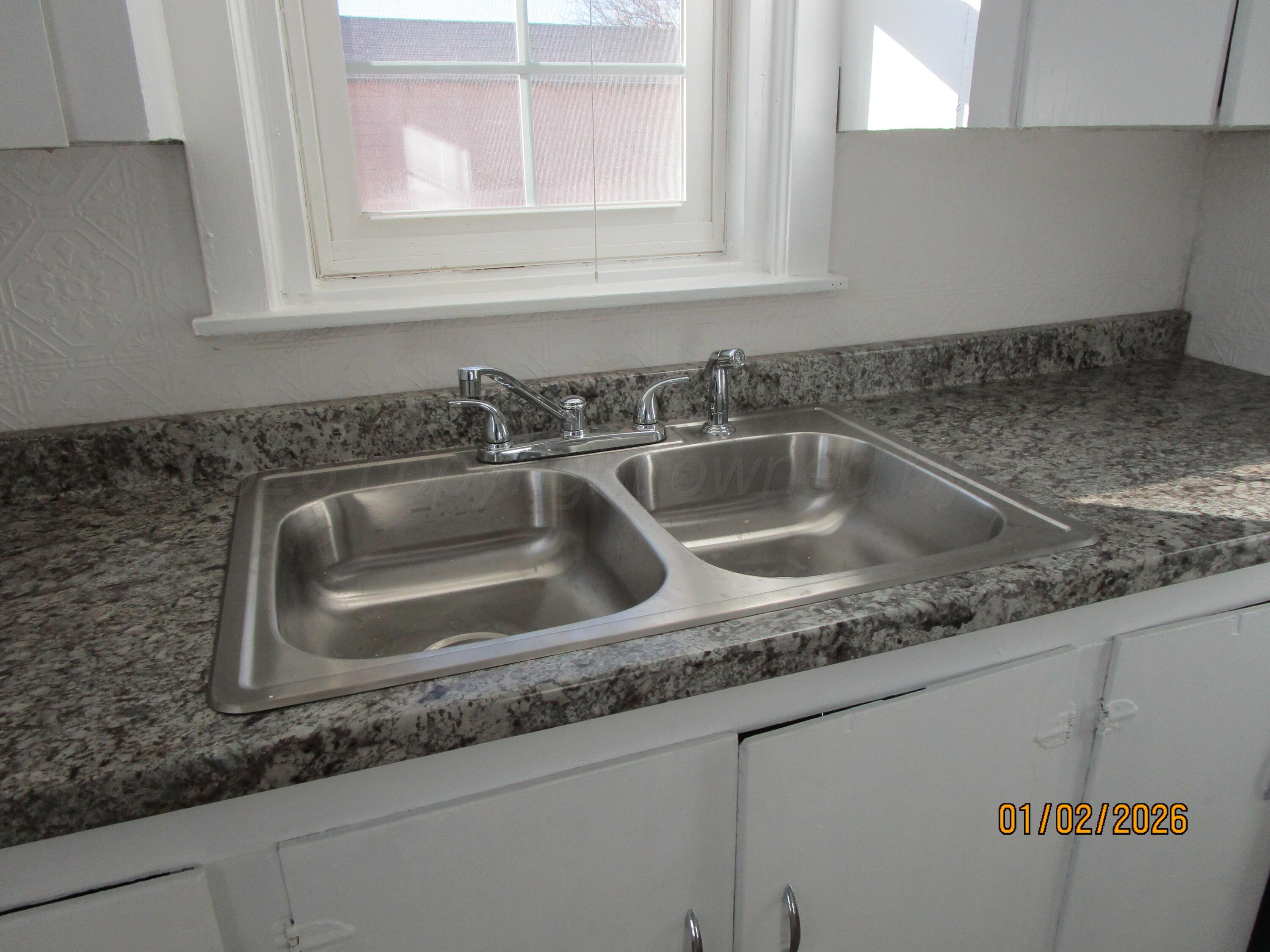 111 West Grand Street Borger, TX 79007 - Photo 3 of 6 a close view of sink and tap