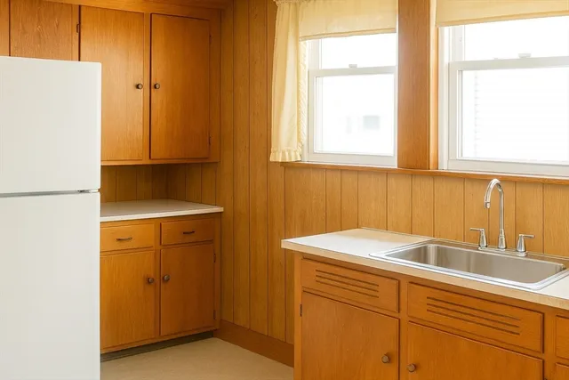 a view of a kitchen with a sink