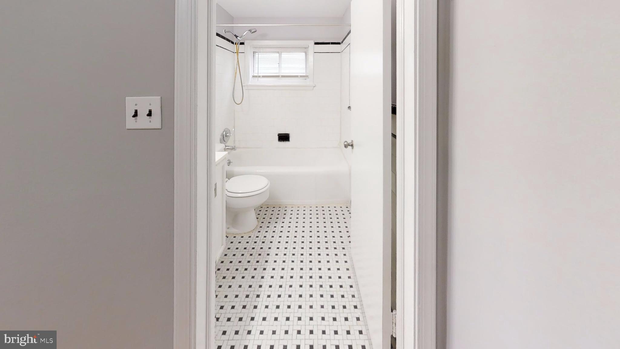 5626 Braxfield Road Baltimore, MD 21227 - Photo 14 of 23 Charming Full Bathroom