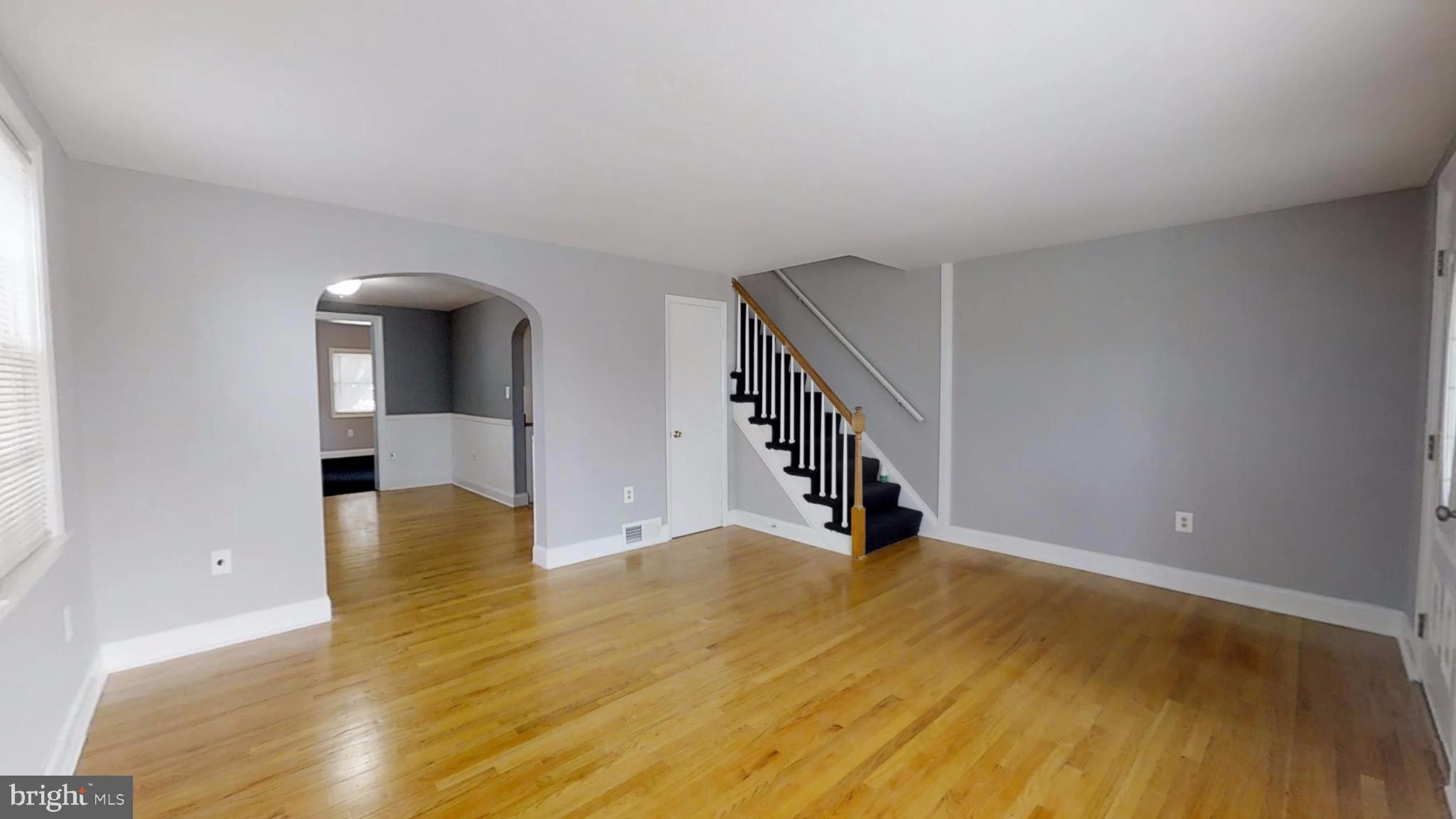 5626 Braxfield Road Baltimore, MD 21227 - Photo 3 of 23 Living Room with Gorgeous Hard Woods