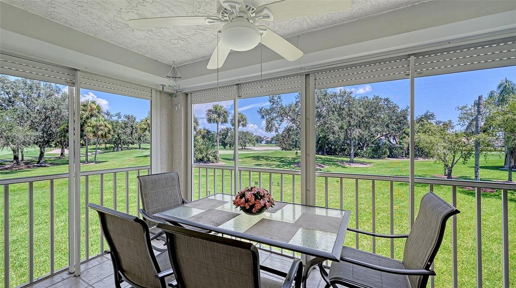 6505 Stone River Road, Unit 209 Bradenton, FL 34203 - Photo 13 of 47 a view of a dining room with furniture window and outside view