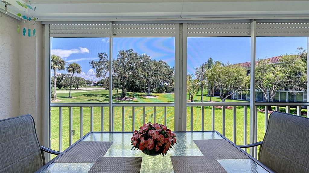 6505 Stone River Road, Unit 209 Bradenton, FL 34203 - Photo 15 of 47 a view of a city from a balcony