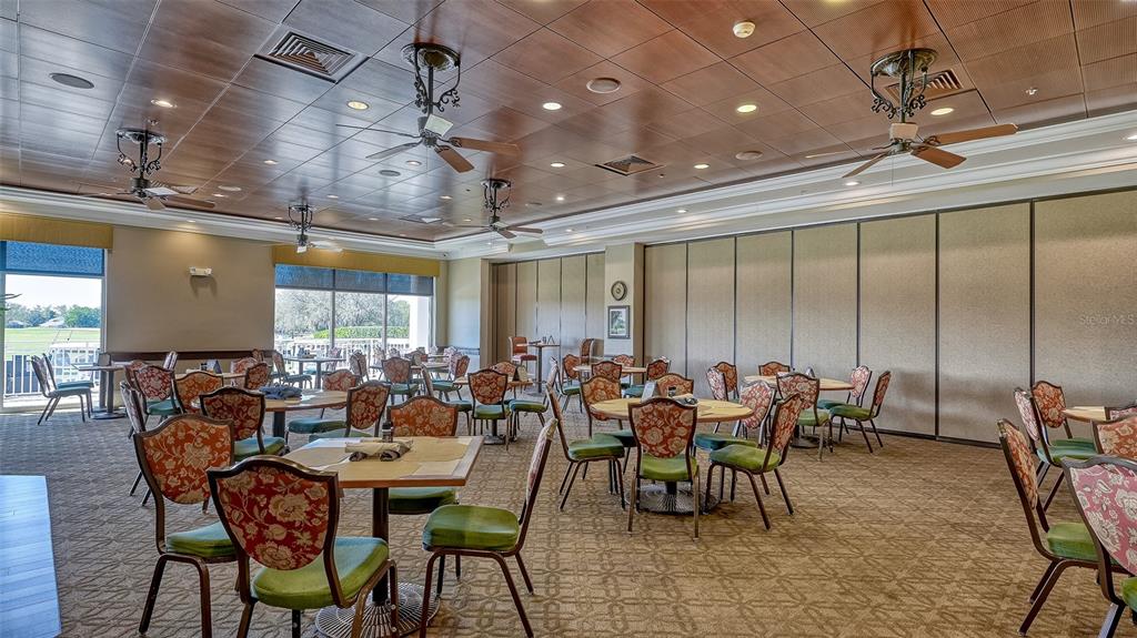 6505 Stone River Road, Unit 209 Bradenton, FL 34203 - Photo 34 of 47 a view of a dining room with furniture window and outside view