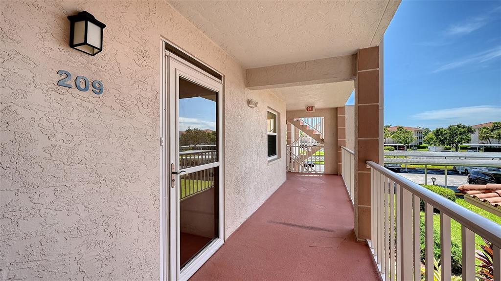 6505 Stone River Road, Unit 209 Bradenton, FL 34203 - Photo 4 of 47 a view of a balcony with city view
