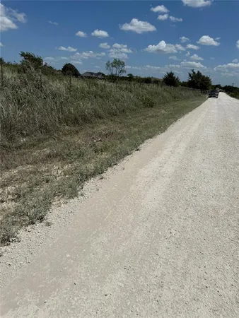 a view of a lake with mountains in the background