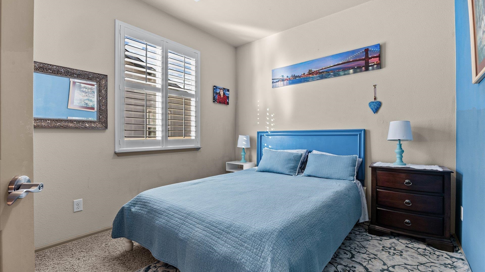 593 Sinatra Way Grand Junction, CO 81501 - Photo 18 of 23 a bedroom with a bed and a window