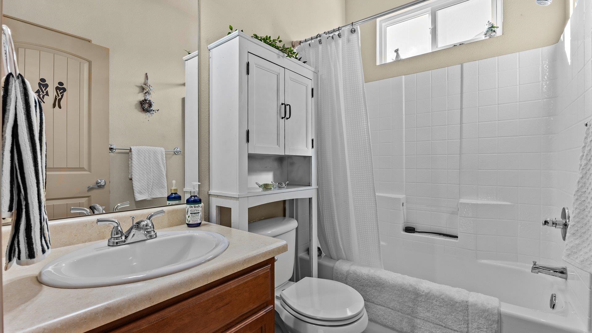 593 Sinatra Way Grand Junction, CO 81501 - Photo 20 of 23 a bathroom with a sink toilet tub and shower