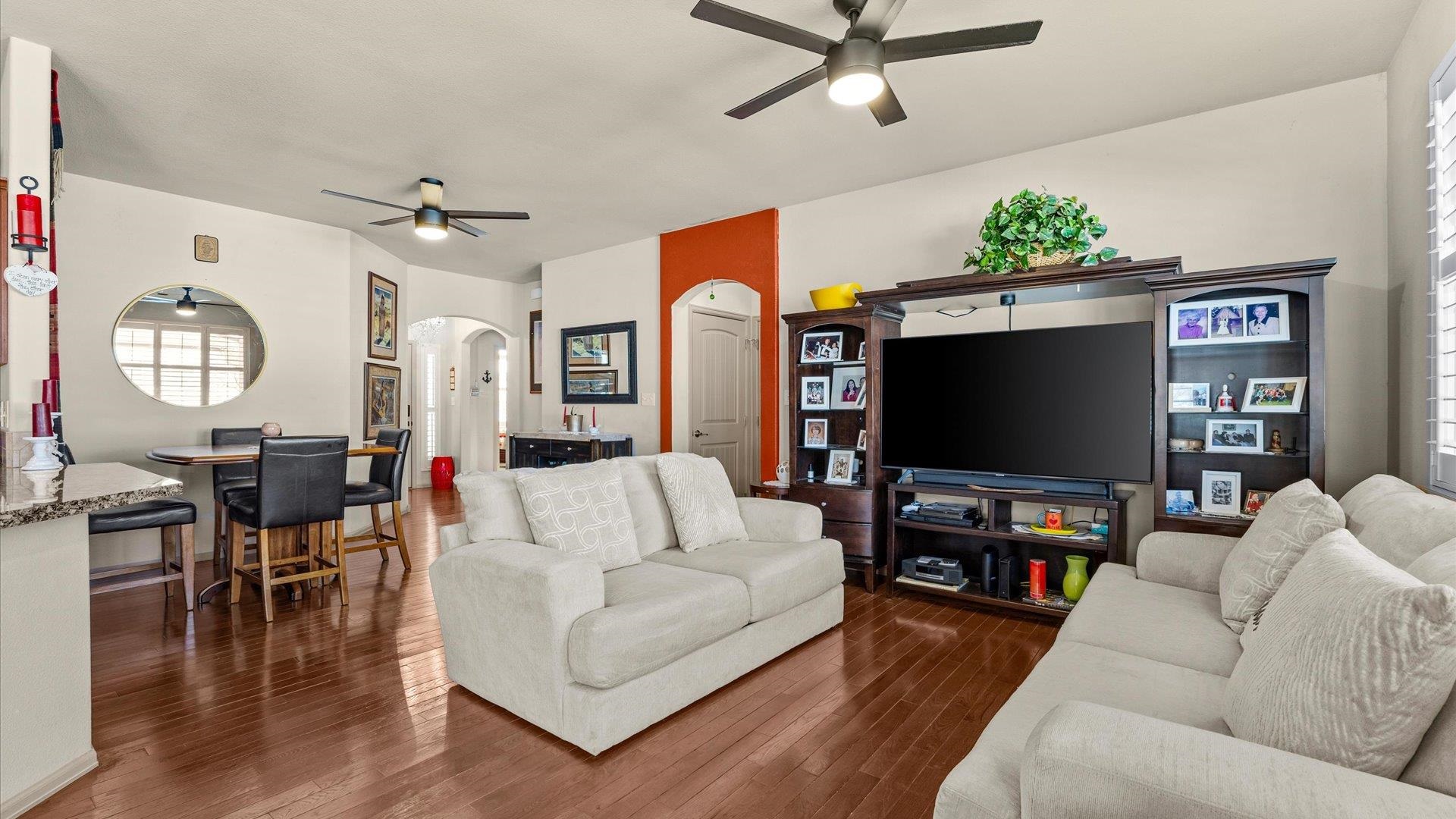 593 Sinatra Way Grand Junction, CO 81501 - Photo 5 of 23 a living room with furniture and a flat screen tv
