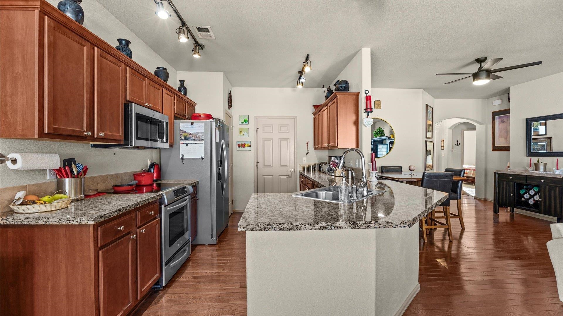 593 Sinatra Way Grand Junction, CO 81501 - Photo 8 of 23 a kitchen that has a lot of cabinets