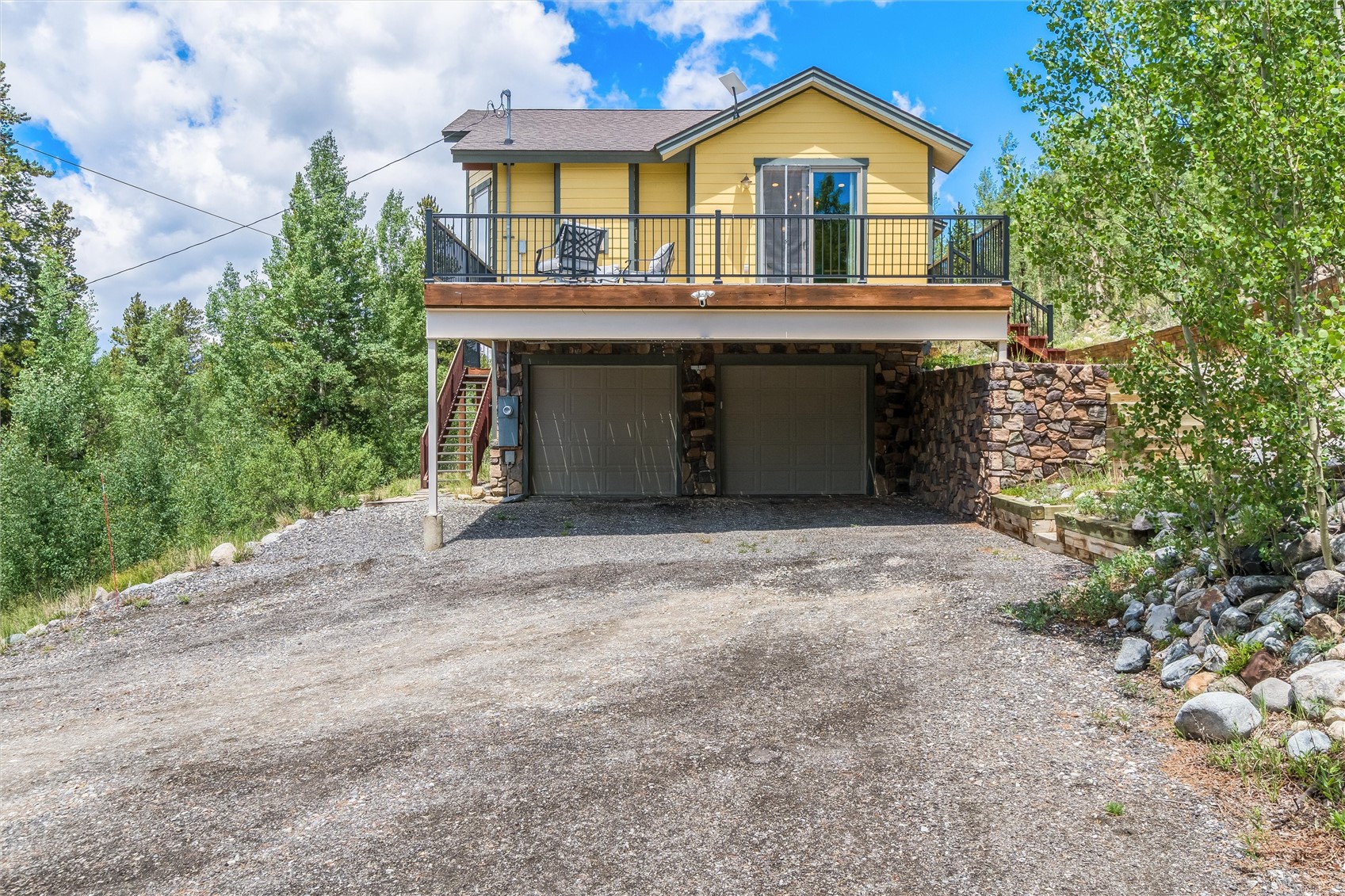 592 Ponderosa Road Fairplay, CO 80440 - Photo 42 of 45 a front view of a house with a garden