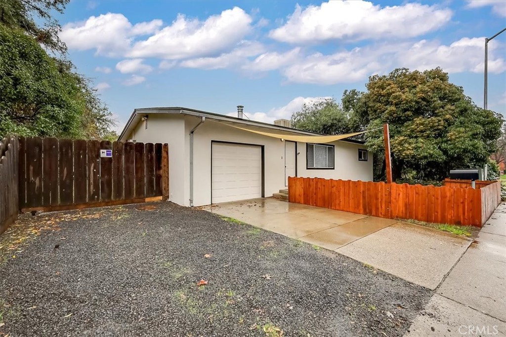 1291 East Chico, CA 95926 - Photo 2 of 29 a view of backyard of house with wooden fence