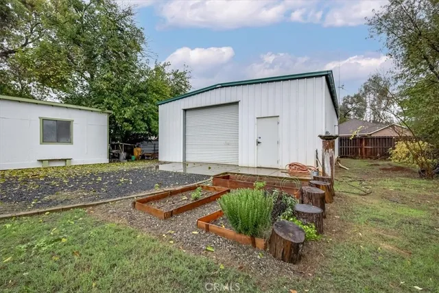 a house view with a backyard space