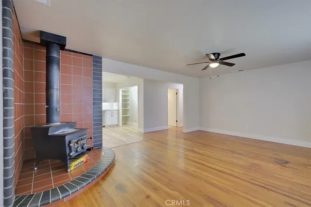 a view of an empty room with glass door