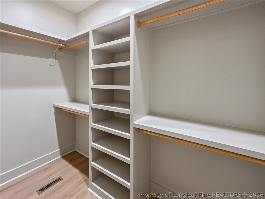 900 Niagara Carthage Road Carthage, NC 28327 - Photo 14 of 38 a view of walk in closet with empty racks