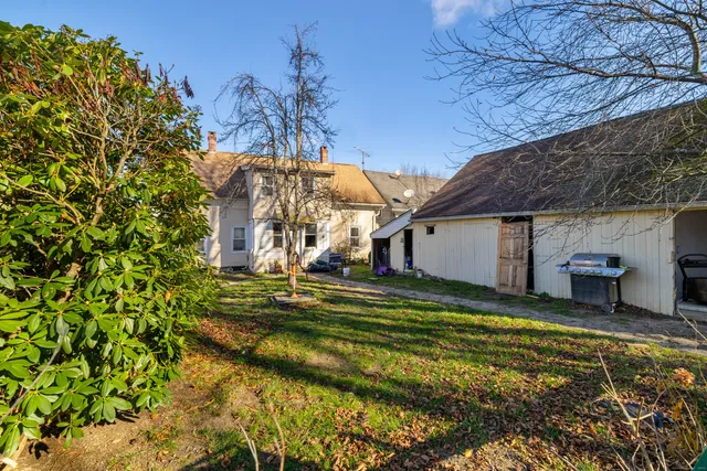 a view of a house with a big yard