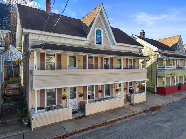 a front view of a house with windows