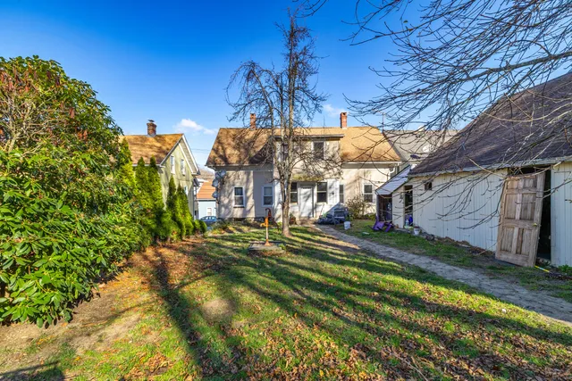 a view of a house with a big yard