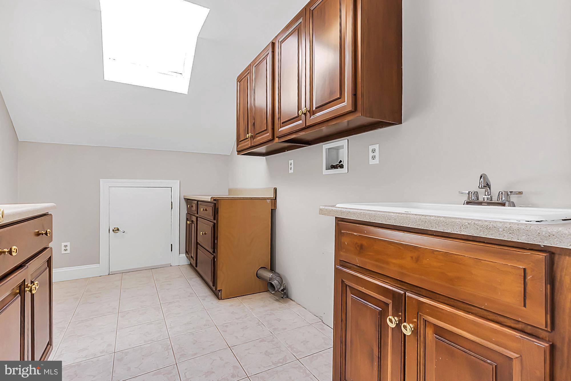 1 Rapps Run Drive Malvern, PA 19355 - Photo 39 of 71 2nd Floor Laundry Room w/Skylight