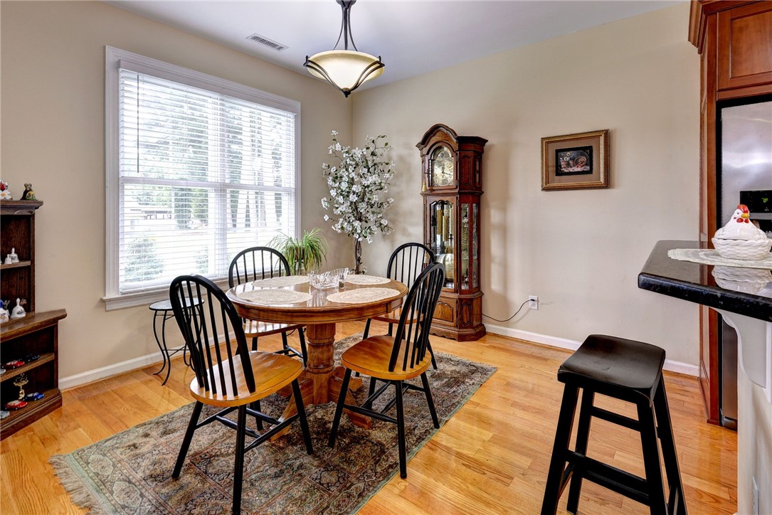 11 Butler Farm Road Hampton, VA 23666 - Photo 16 of 39 Dining area featuring light wood-style floors and baseboards