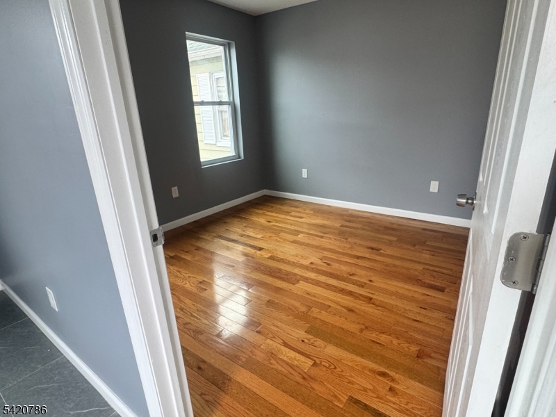 17 Home Street Somerset, NJ 08873 - Photo 17 of 20 a view of empty room with window