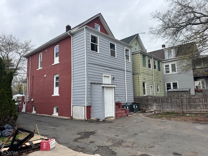 17 Home Street Somerset, NJ 08873 - Photo 4 of 20 a front view of a house with a yard