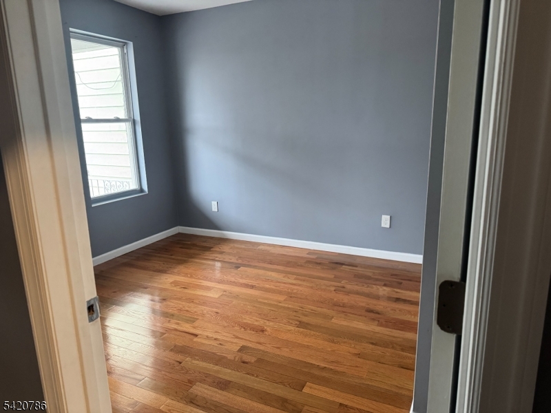 17 Home Street Somerset, NJ 08873 - Photo 9 of 20 a view of empty room with wooden floor