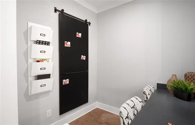 a view of a bedroom with a bed