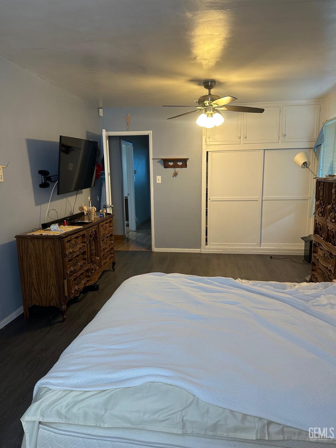 Undisclosed Address Lawndale, CA 90260 - Photo 6 of 7 a bedroom with a bed and a flat screen tv