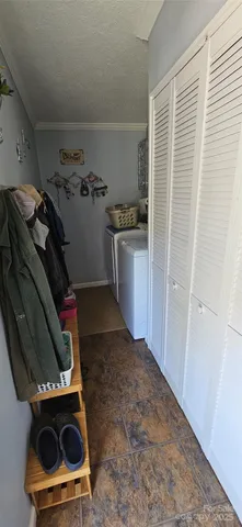 a view of swimming pool with seating area