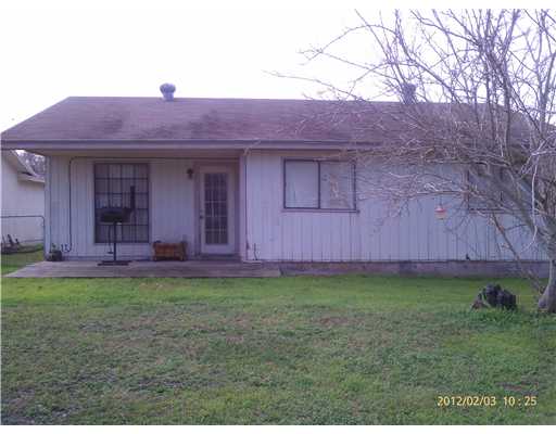 123 Dell Street Portland, TX 78374 - Photo 5 of 10 a view of a house with a backyard
