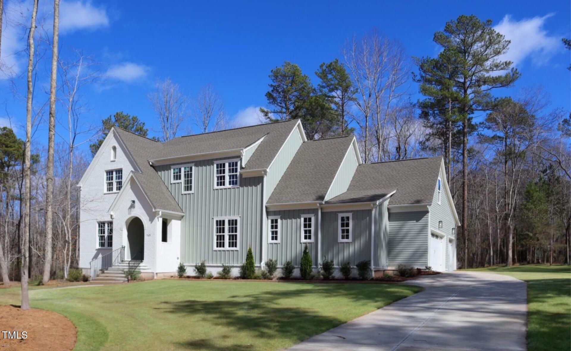 7112 Camp Side Court Raleigh, NC 27613 - Photo 1 of 39 a front view of house with yard