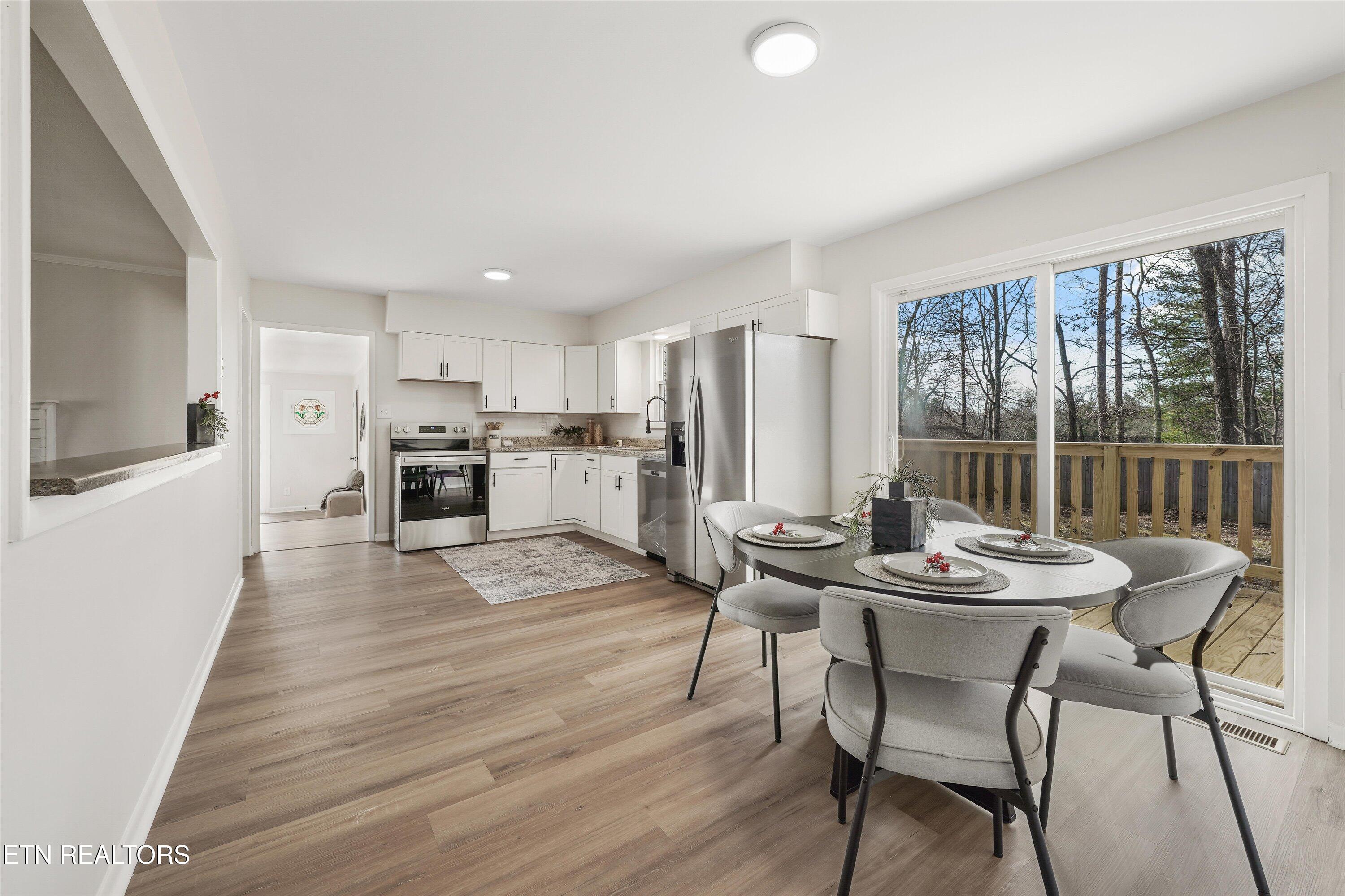 5817 Stoneleigh Road Knoxville, TN 37912 - Photo 12 of 29 Dining Area Opening to a Rear Deck